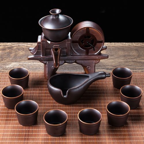 石磨悠悠，茶香袅袅 秦艺粗陶瓷半自动茶具套装的复古美学与懒人哲学